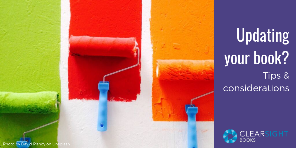 painting a wall with three bright colored paint rollers to represent updating your book