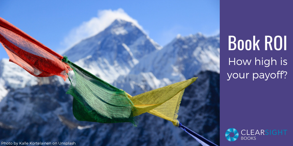 How high is your book ROI? Image of mountain top with climber's flags.