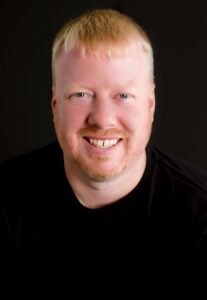 headshot of Jason Greer