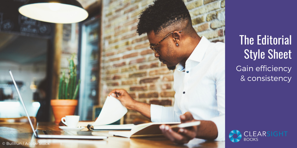 Black man wearing white shirt and glasses sitting at a table with a laptop and consulting two books. Text: The Editorial Style Sheet: Gain efficient and consistency. 