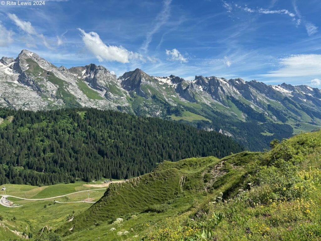 amazing view of a mountain range from the top of another mountain